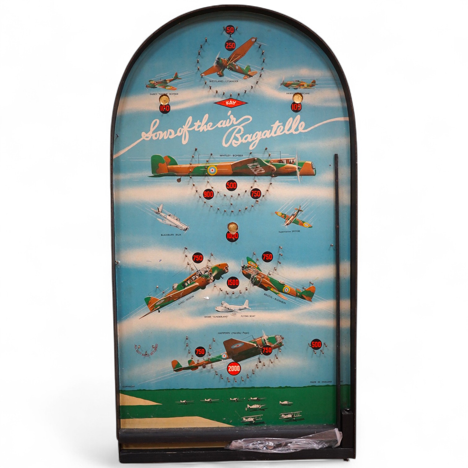 WWII aviation interest; a 1940s bagatelle table pinball game by Kay, Made in England, entitled ‘Sons of the Air’, of hardboard construction, with applied paper surface with images of 1940s RAF aircraft, including a Hawke